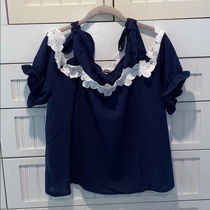 Off the shoulder flower detailed top